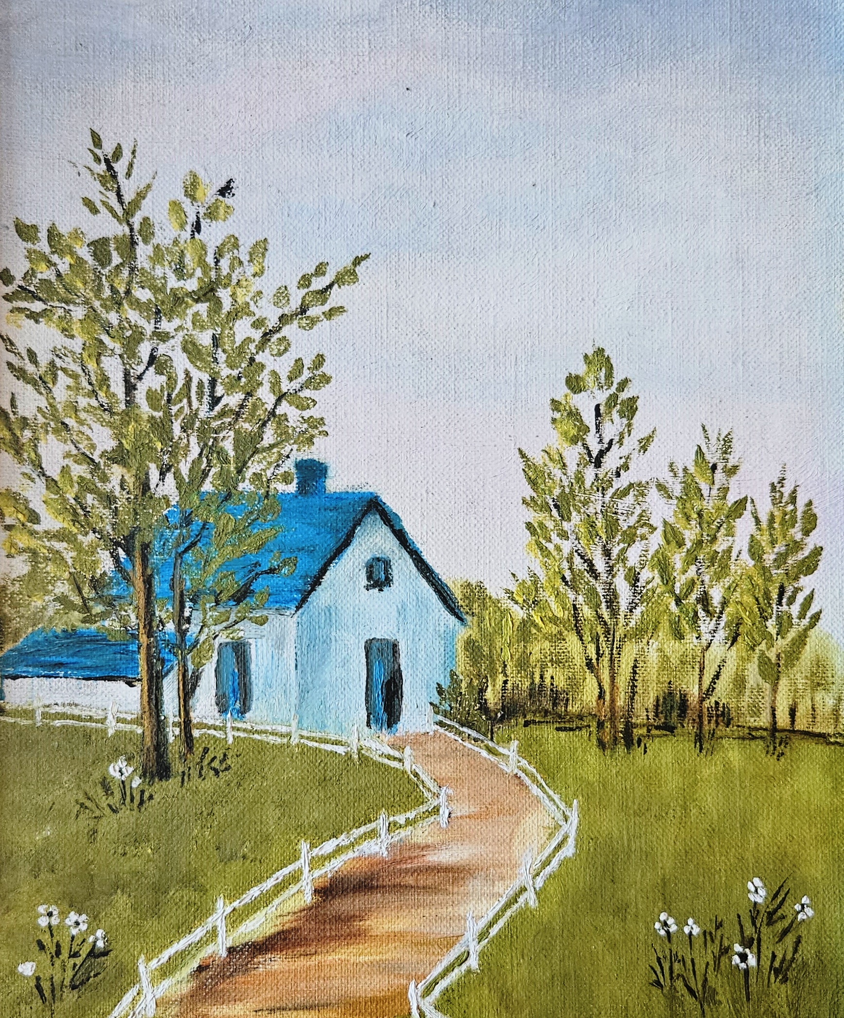 Maison un chemin et des arbres d'Andréa